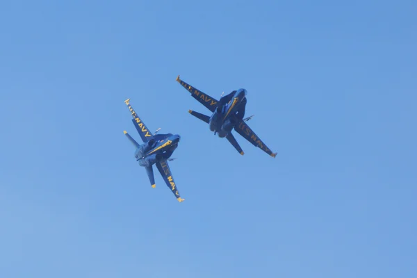 Jet Blue Angels F-18 Hornet aircraft flying at 2015 Miramar Air Show in San Diego, California