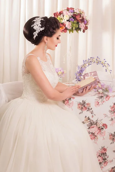Beautiful bride with fashion hairstyle and make-up