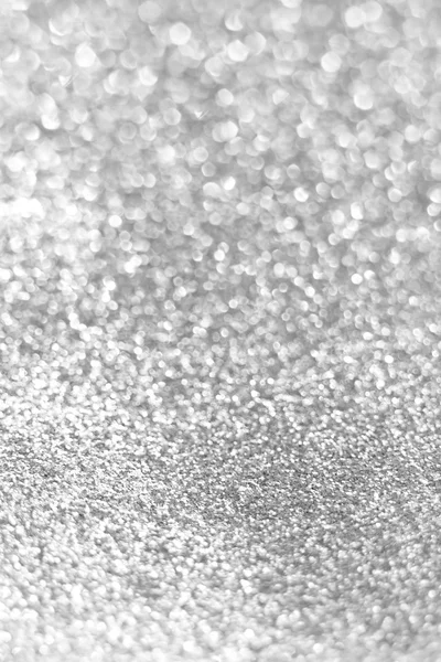Shiny silver glitter background, selective focus