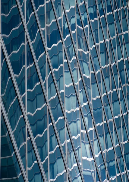 Abstract Forms of sun reflections in glass building