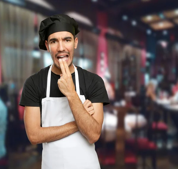 Chef with disgust gesture