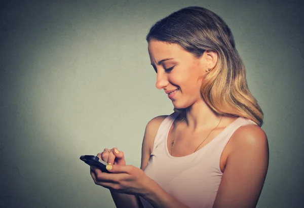 Portrait woman using app on a smart phone