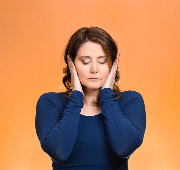 Woman, covering ears. Hear no evil concept