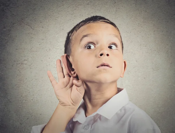 Curious man, boy, listens, hand to ear gesture