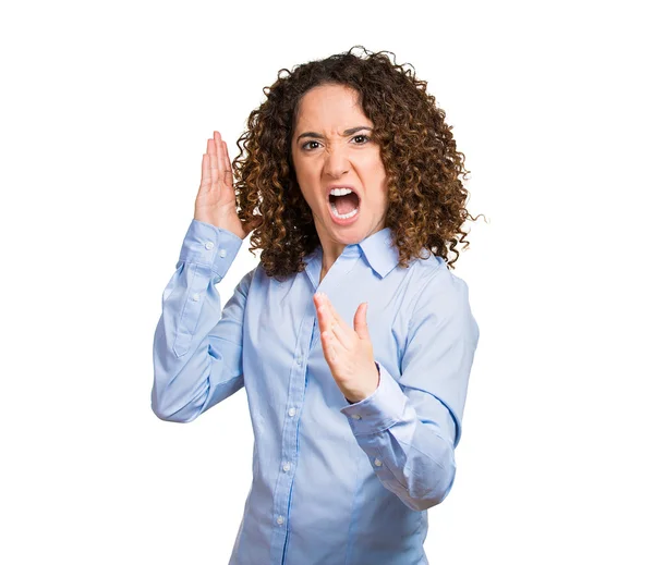 Angry mad, furious woman raising hands in air