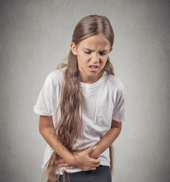 Teenager girl with stomach pain