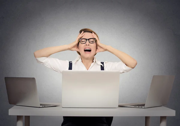 Stressed nervous businesswoman in her office