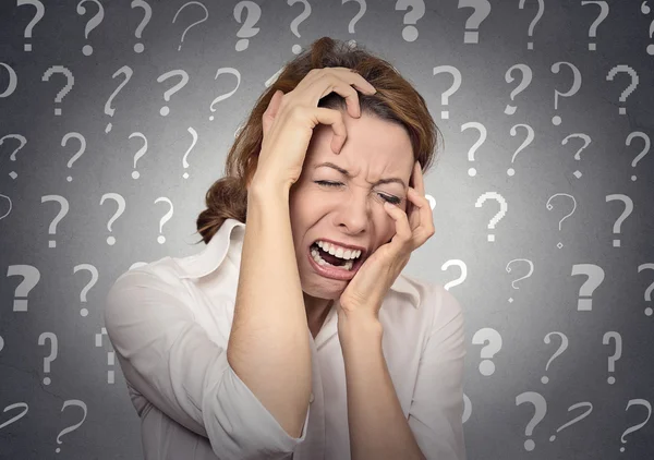 Stressed crying woman has many questions