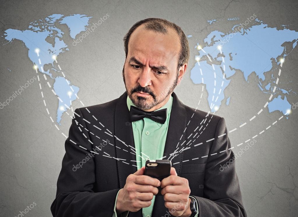 Business man holding smartphone connected browsing internet ...