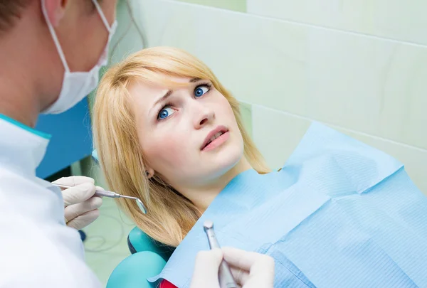 Scared patient at dentist office