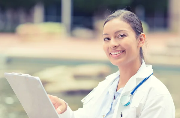 Doctor healthcare professional isolated outside clinic hospital background