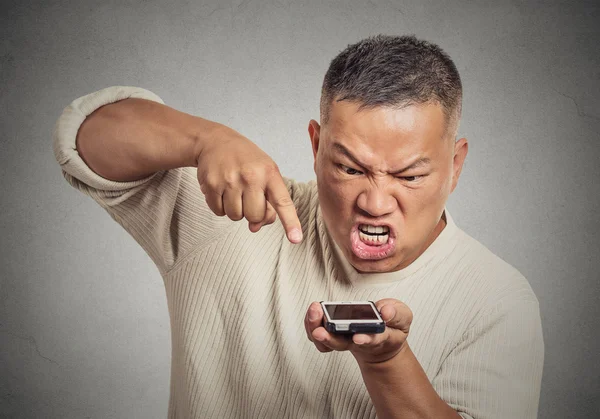 Man, guy pissed off employee screaming while on mobile phone