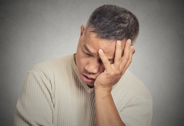 Portrait headshot sad bothered stressed middle aged man