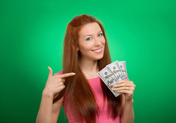 Woman showing holding money dollar bills