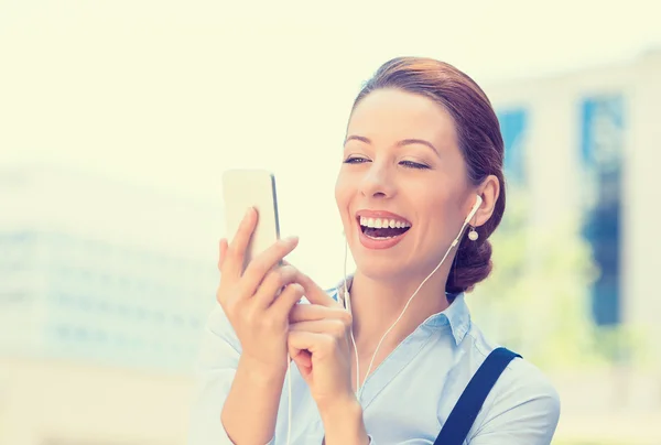 Business woman sending text message from mobile smartphone