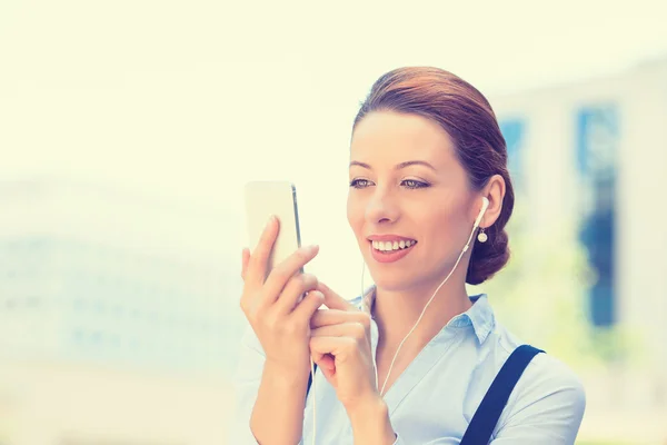 Business woman sending text message from mobile smartphone