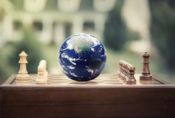 Chess game figures earth globe isolated on home background