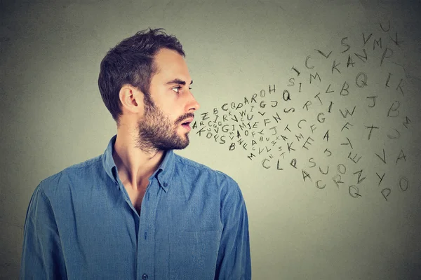 Man talking with alphabet letters coming out of his mouth