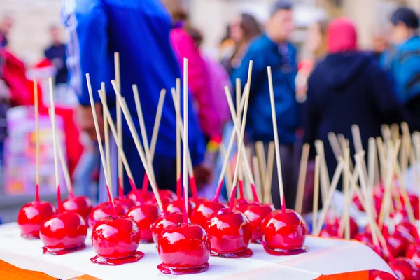 Candy apples on sale in a Christmas market