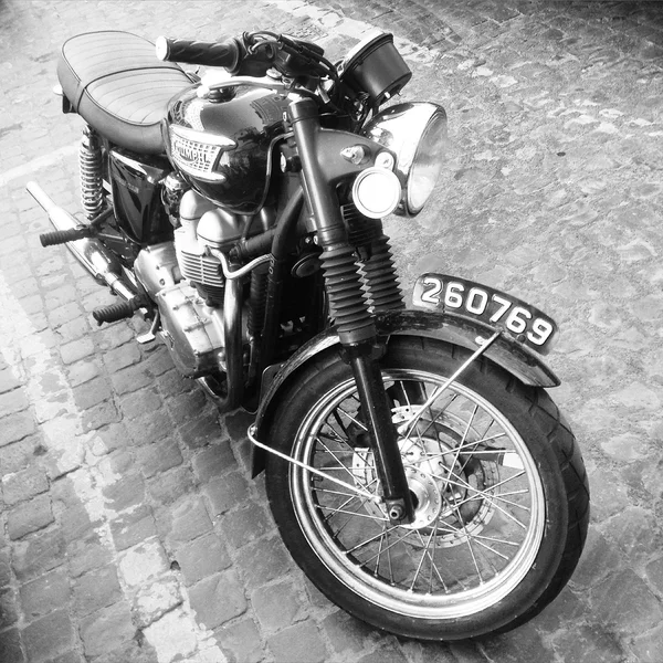 Triumph motorcycle on paving stone