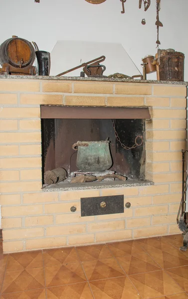 Old fireplace of a country house.