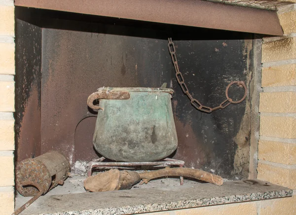 Old fireplace of a country house.