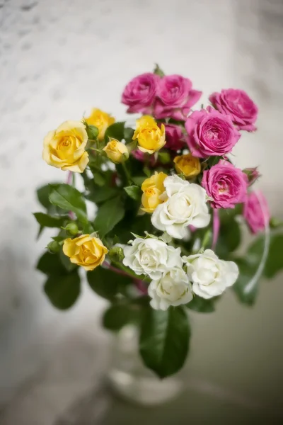 Blooming bouquet of flowers - small roses