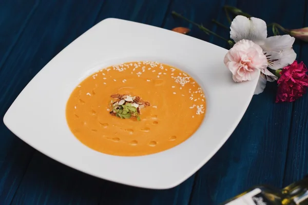 Cream of pumpkin soup, carrots with coconut milk and olive oil