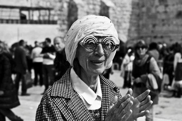 Old woman in funny glasses