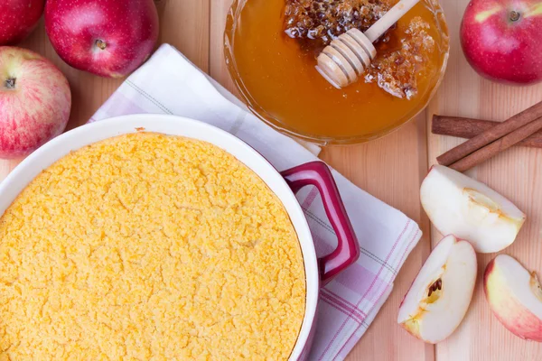 Couscous casserole with apples, honey and cinnamon