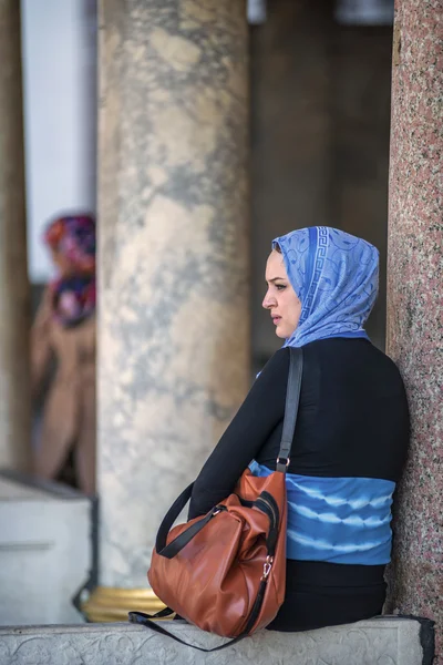 ISTANBUL, TURKEY - JULY 07: Muslim woman visiting Topkapi Palace