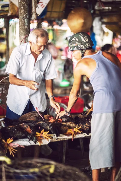 Hanoi, Vietnam - January 20, 2014: Vietnamese street market sell