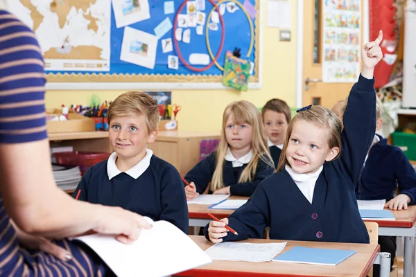 Class Of Elementary School Pupils Answering Question