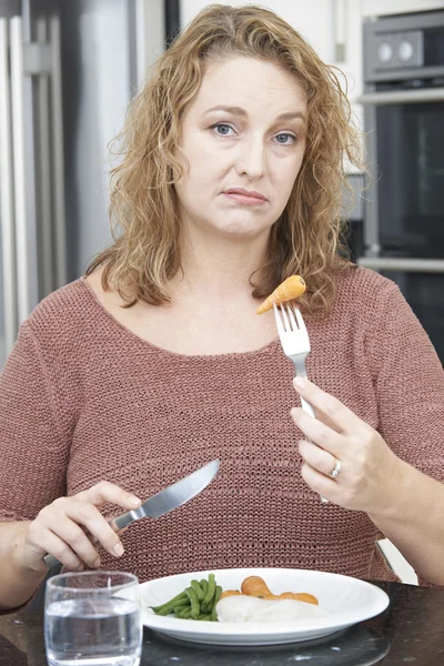 Woman On Diet Fed Up With Eating Healthy Meal