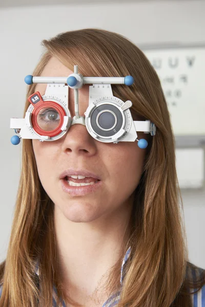 Woman Having Sight Test At Optometrist