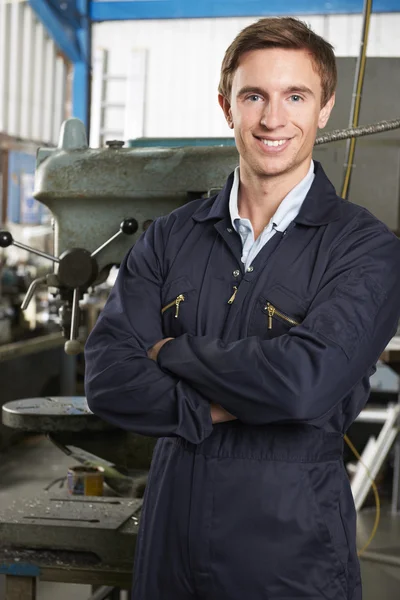 Portrait Of Engineer On Factory Floor