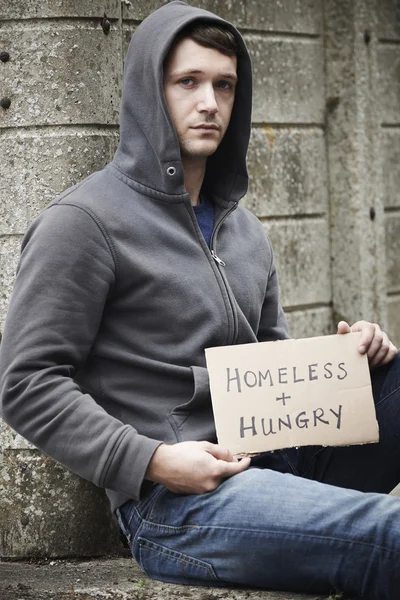 Homeless Young Man Begging On Street