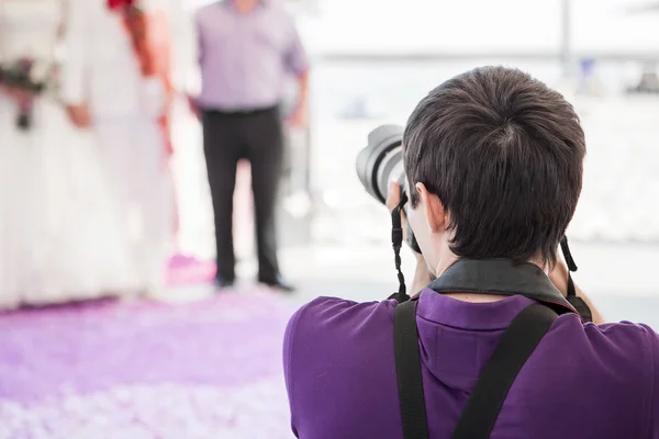 Wedding photographer in action