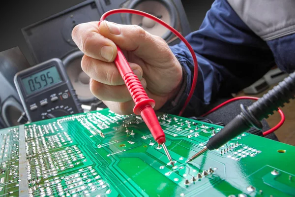 Checking circuit by Multimeter. Electrical engineer on during ch