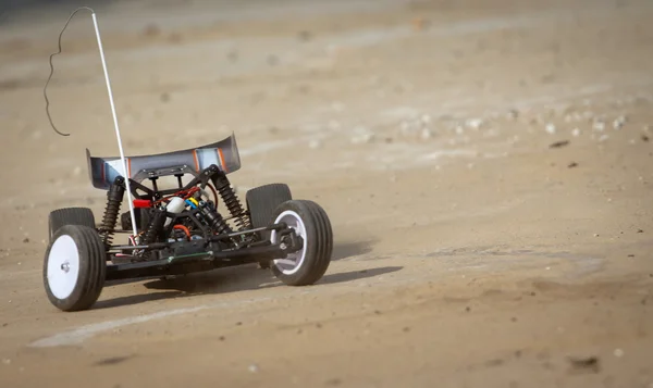 Remote control car running on sand