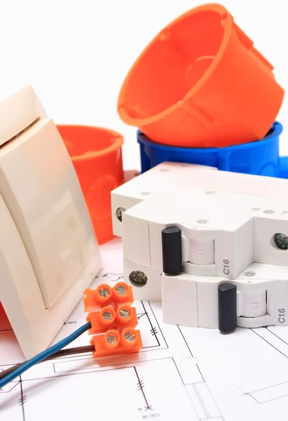 Components for electrical installations and diagrams