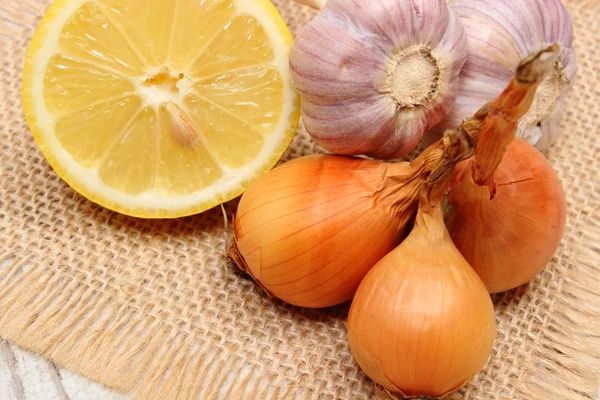 Fresh onions, garlic and lemon, healthy nutrition and strengthening immunity
