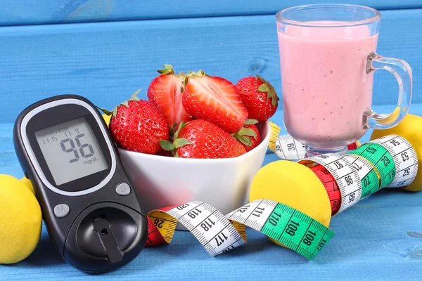 Glucometer with sugar level, healthy food, dumbbells and centimeter, diabetes, healthy and sporty lifestyle