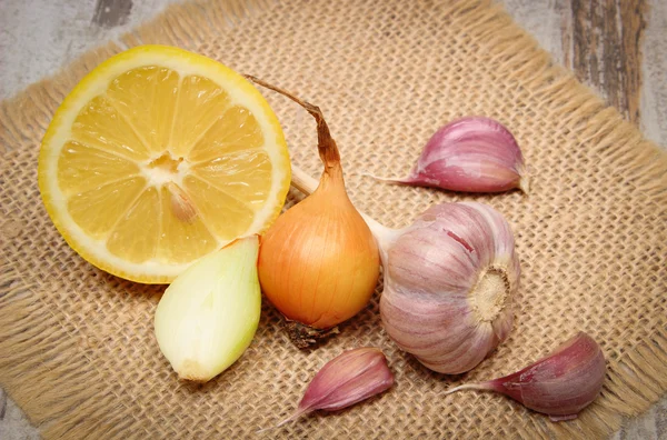 Fresh onion, garlic and lemon, healthy nutrition and strengthening immunity
