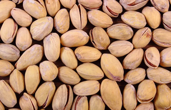 Pistachio nuts as background, healthy eating