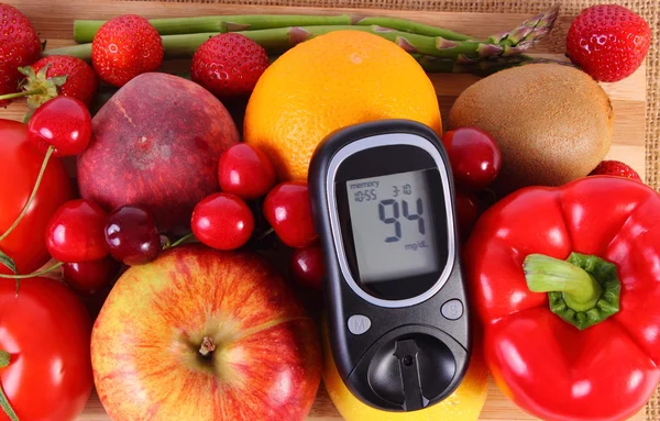 Glucometer with fruits and vegetables, healthy nutrition, diabetes
