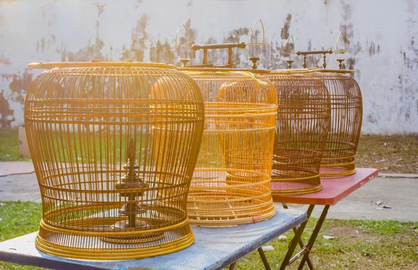 Rattan wood bird cages on the tables