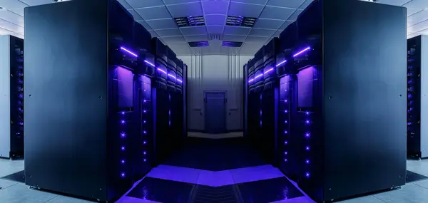 Symmetrical data center room with futuristic beams and rows of equipment