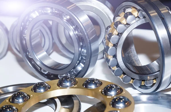 Series of ball bearings background with light effect close-up