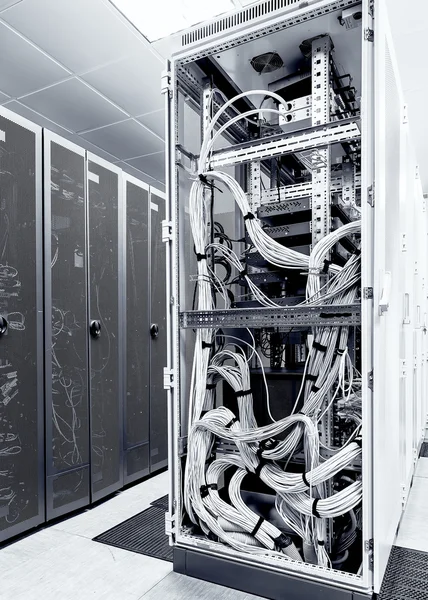 Black and white server communications equipment inside view with motion